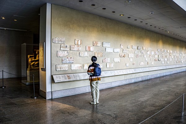 Teen Girl viewing Ancient Egyptian Hieroglyphs, Temple of Dendur