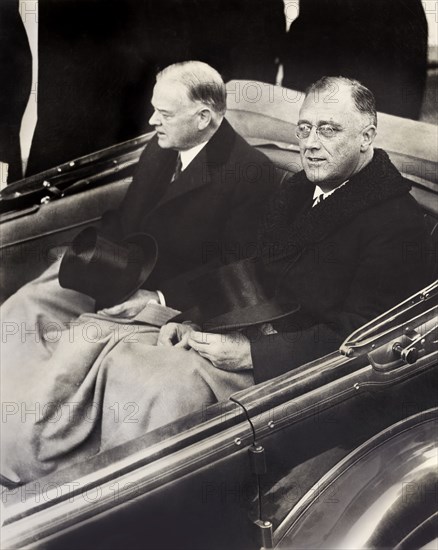 U.S. President Herbert Hoover and U.S. President-Elect Franklin Roosevelt in Convertible Automobile on way to U.S. Capitol for Roosevelt's Inauguration