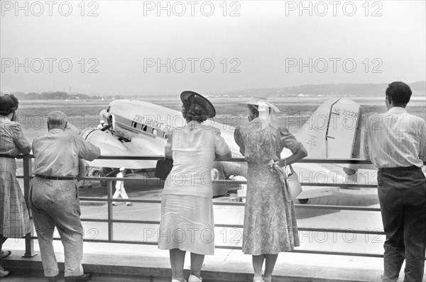 Visitors watching Airplane from Observation Platform