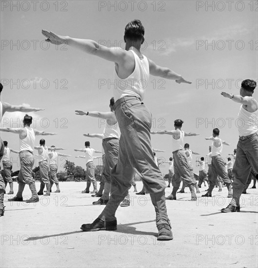 Enlisted Men going through Calisthenics Routine