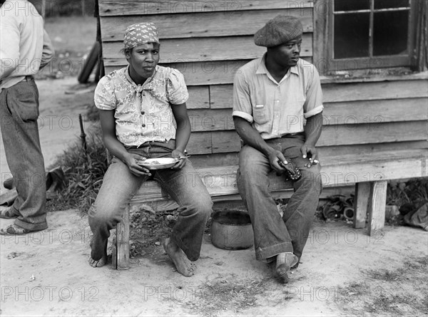 Florida migrants having lunch at camp near Old Trap