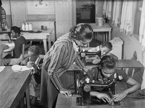 Students learning to Sew on Sewing Machines