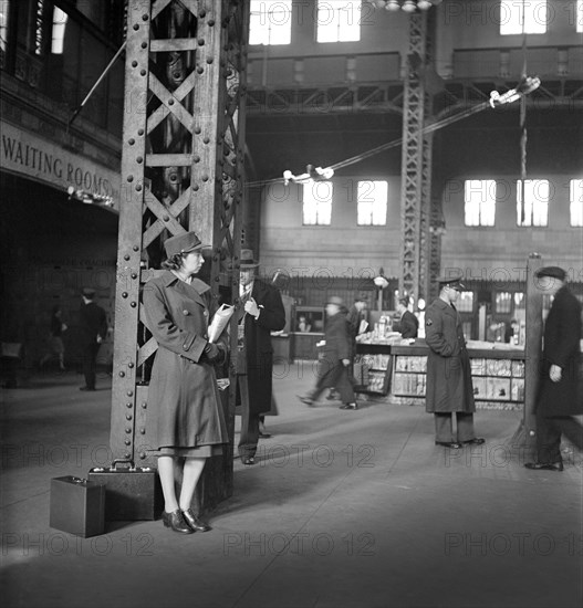 Member of Women's Army Auxiliary Corps waiting for Train