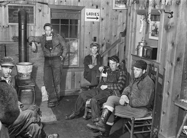 Hired help resting after day's work on Upwey horse farm