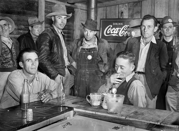 Construction Workers from Camp Livingston U.S. Military Base eating and hanging around new Cafe