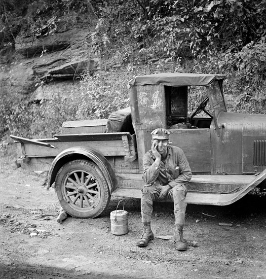 Miner waiting for ride home