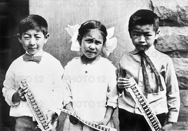 Three Young Penny Collectors