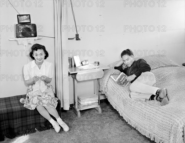 Mrs. Shimizu seated on Couch with Lacework