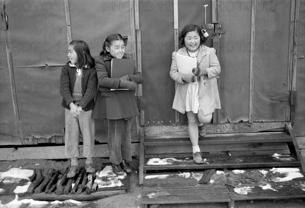 Three Smiling School Children