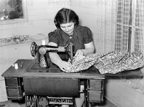 woman, sewing machine, textiles, handmade, historical,