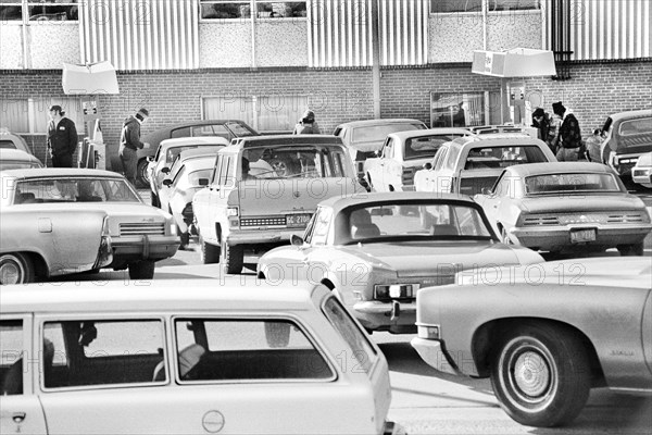 Cars lined up at Gas Station