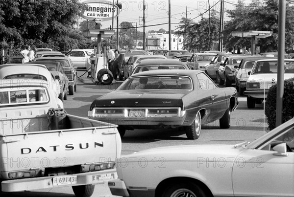 Long Lines of Cars waiting for Fuel at Gas Station