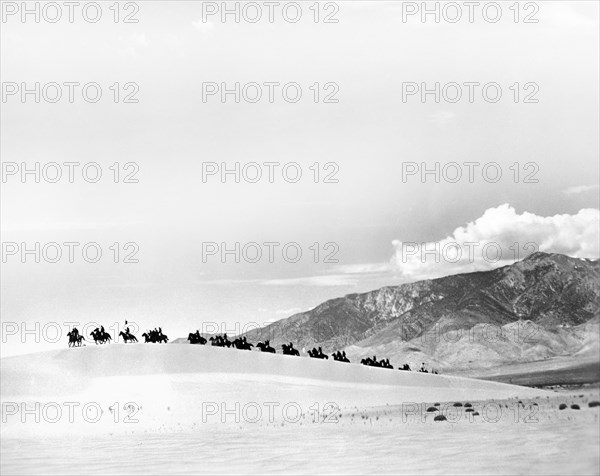 Military on Horseback in Desert