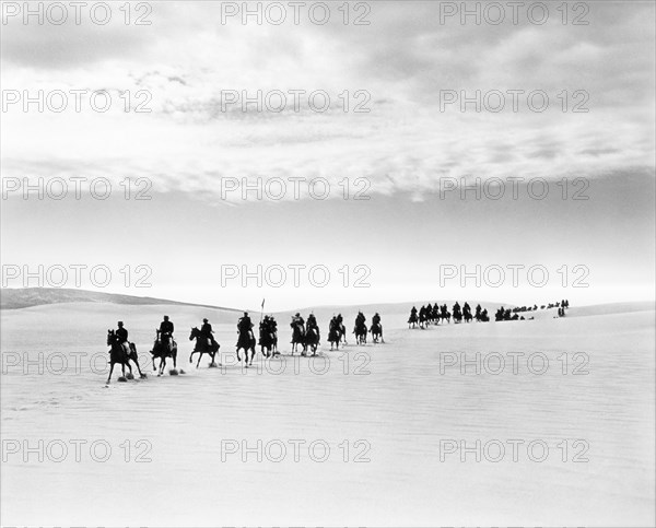 Military on Horseback in Desert