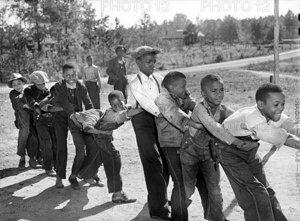 Group of Young Schoolboys playing during Recess