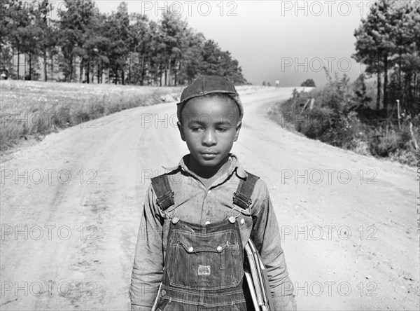 Young Boy walking to School