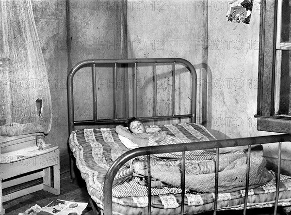 Young Boy in Bed with Measles