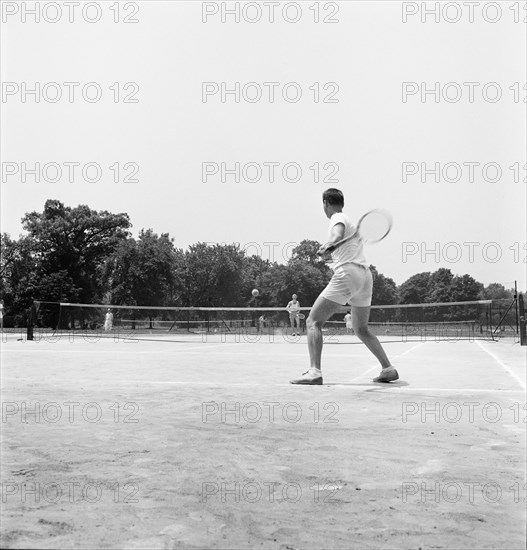 Two Men playing Tennis