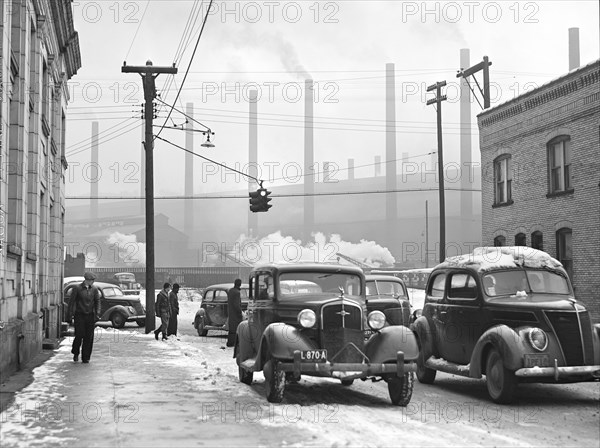 Cars of Steelworkers leaving  Mill