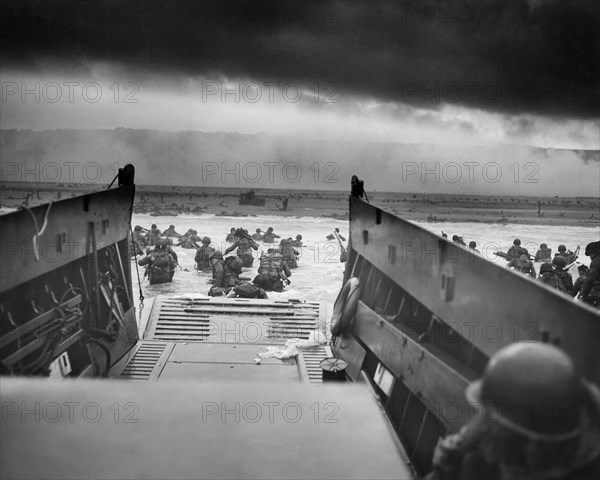 American Soldiers wading into Water after landing in Normandy