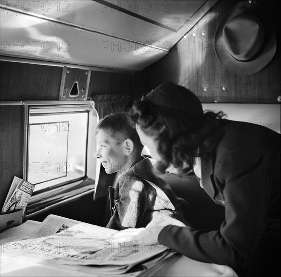 Child Passenger and Female Flight Attendant