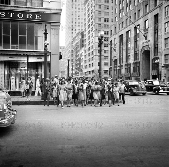 Crowd of Pedestrians on Downtown Street