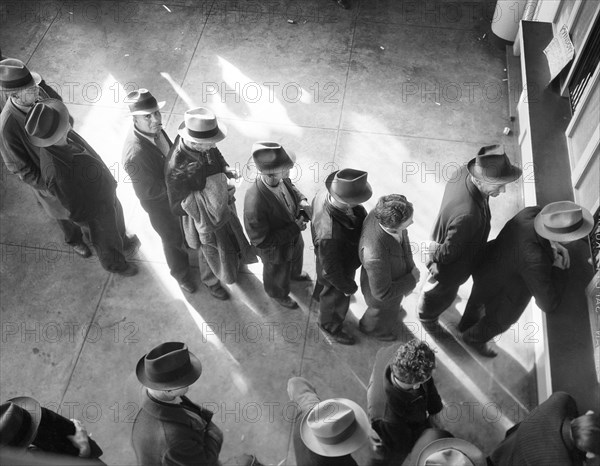 Men lined up to register for Unemployment Benefit