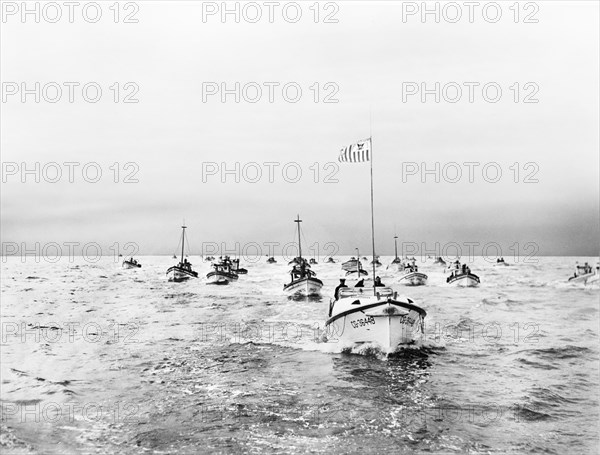 U.S. Coast Guard Motor Lifeboat providing escort to Crab Fishermen as wartime precaution