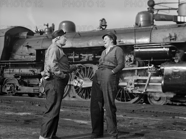 Two Female Railroad Workers enjoying a break from their jobs