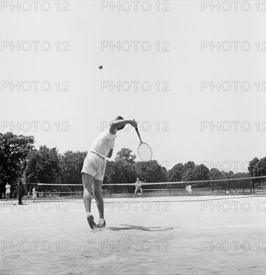 Two Men playing Tennis