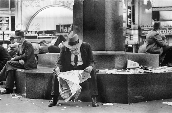 Man reading Newspaper
