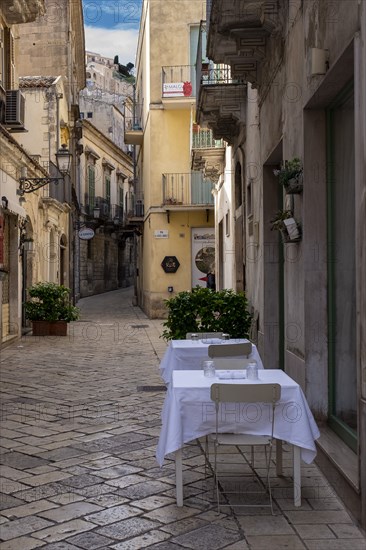 Outdoor Restaurant Seating on quaint narrow Street