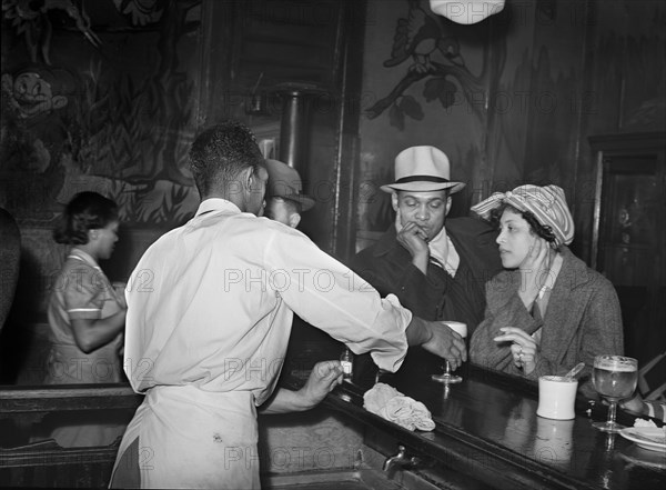 Bartender Serving Drinks at Tavern