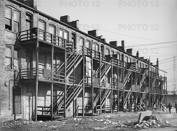 Rear View of Apartment Houses with Wood Staircase