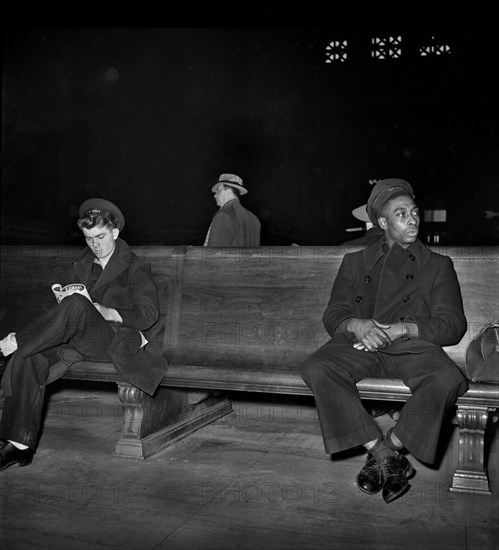 Two Sailors in Main Waiting Room waiting for Train