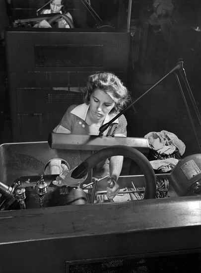 Woman working at Clearance-Grinding Machine