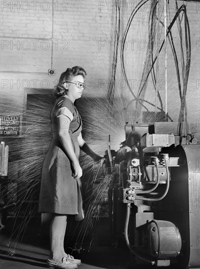 Woman welding Drills to its shanks