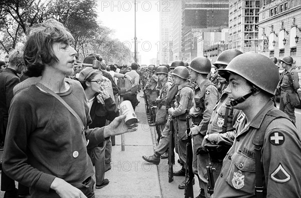 Group of People standing in front of row of National Guard soldiers