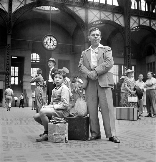 Group of People waiting for Trains