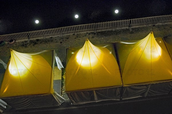 High Angle View of Tented Shops along Tiber River