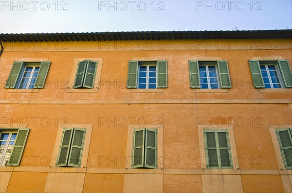 Shuttered Windows of Apartment Building