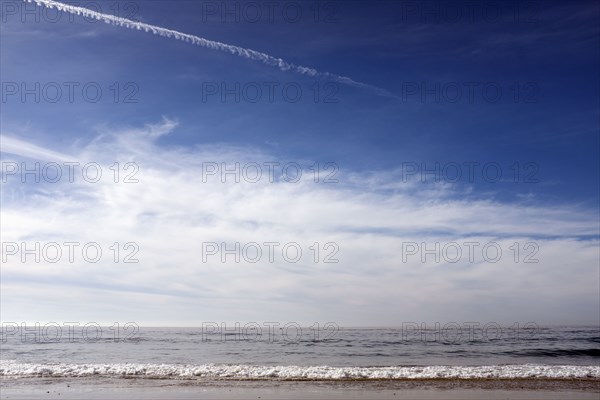 Small Waves on Sandy Beach