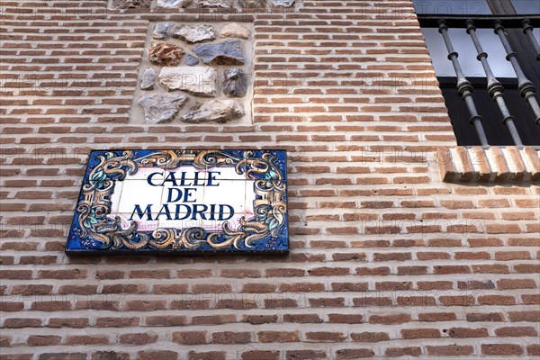 Street Sign on Brick Building