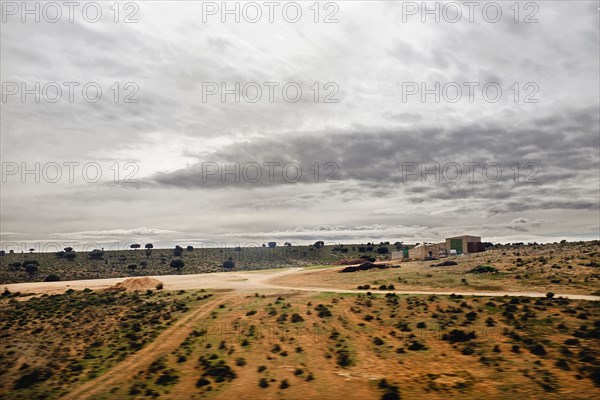 Arid Landscape View through Train Window