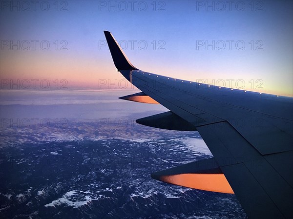 Airplane Wing at Sunset