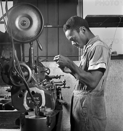 Young Adult Man receiving training as a turret-lathe Worker