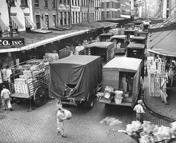 Trucks being loaded with Produce