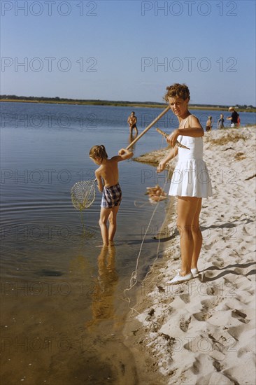 Family crabbing at Beach