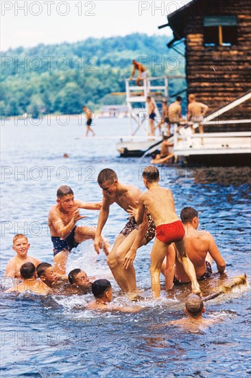Group of Summer Camp Boys playing in Lake