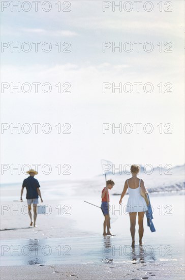 Family crabbing at Beach